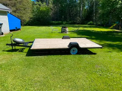 new decking, Led lights and guards, tire, paint, comes with spare. Good for sled,quad or utility. So...
