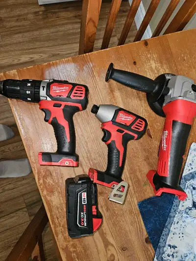 Milwaukee m18 Hammer Drill,Impact Driver,and  Grinder 1, View more