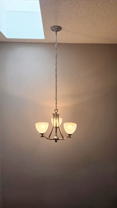 3 light chandelier / pendant light in brushed nickel finish. Bulbs Included. Pickup near Langstaff a...