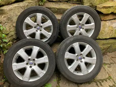 Set of 4 premium Pirelli Scorpion All Season Plus 3 tires (235/60R18) mounted on alloy rims, gently...