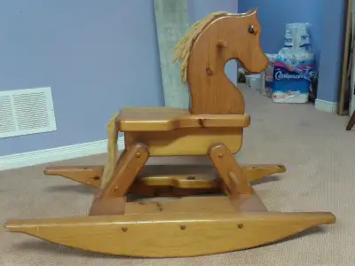 Solid wood rocking horse from 1980's. - Barely used, like new condition
