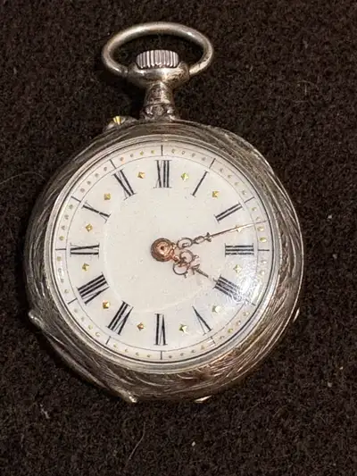 This is a woman’s watch made in the early 1900’s . Has a Swiss movement that does still function . T...