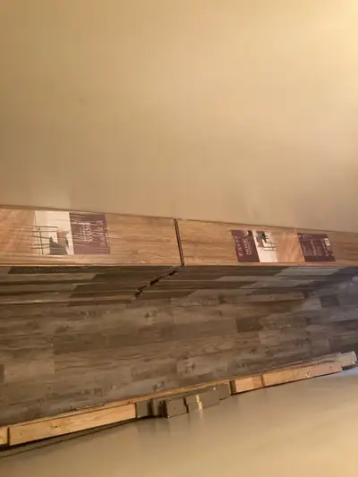 14 boxes of oak hardwood laminate flooring, View more