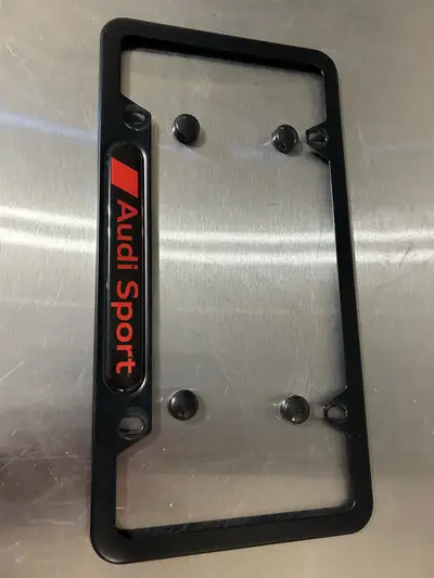 This Audi Sport license plate frame is a sleek addition to any Audi enthusiast's vehicle, showcasing...