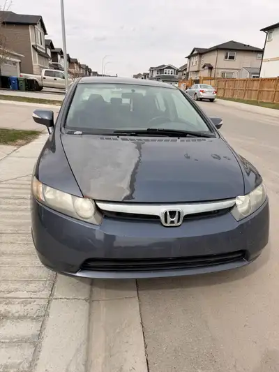 2007 hoda civic for sale very cheap on feul just need some work done on the body. Starts in winter n...