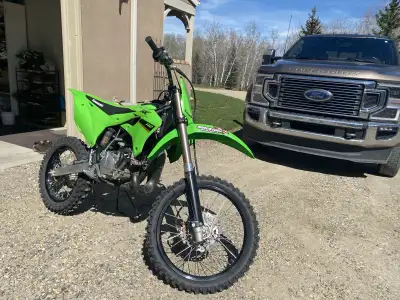 Kx112. Low mileage. Big wheel. Factory tires. After market black plastics. Factory plastics are incl...
