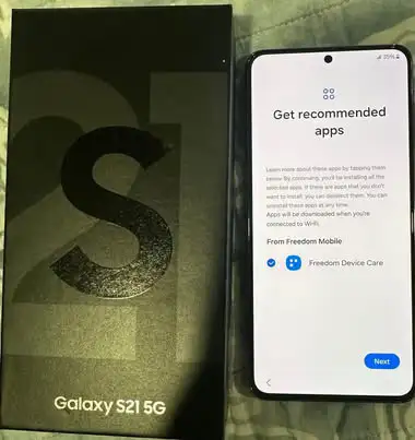 Pristine Samsung Galaxy S21 5G phone. Comes with original box. Phone is a sleek dark gray color.