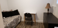 Room/suite for rent. 5 minutes walk from 22nd st sky train.