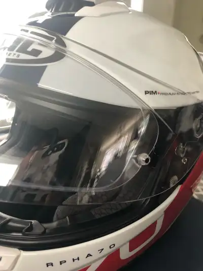 HJC RPHA 70ST Large Excellent condition, used for two 5 day trips. The helmet does not fit my shape...