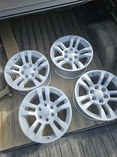 Four 6 bolt 18x8.5 aluminum wheels with tire pressure monitors. fits GM trucks. Were used on a 2025...