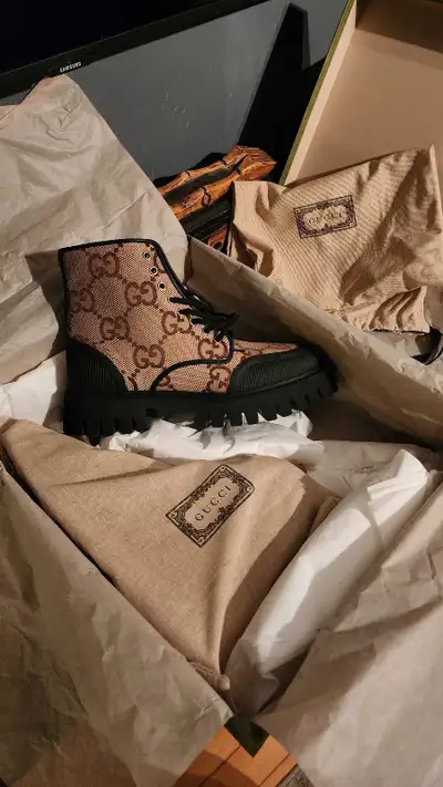 Gucci combat boots., View more