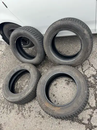 Good condition. Ready to use! 225 65 R17 Bridgestone Winter Tires. Set of 4. Toyota Rav4, Sienna, Ho...