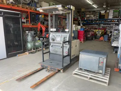 Crown SP3000 Series (Type E) forklift or order picker. 24V battery operated. Capacity of 3000 lbs. L...