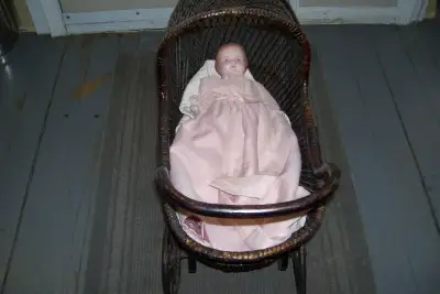 1800s PLASTER DOLL WITH PERIOD WICKER DOLL CARRIAGE, View more