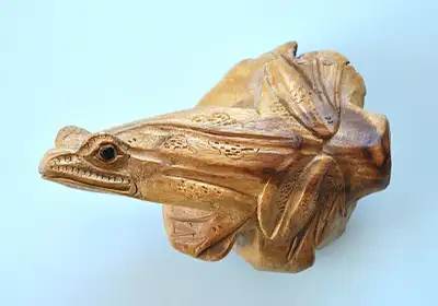 CARVED WOOD FIGURINE, View more