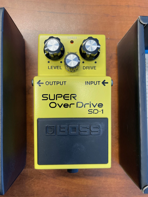 BOSS SD1 SUPER OVERDRIVE PEDAL **NEW** in Amps & Pedals in Moncton
