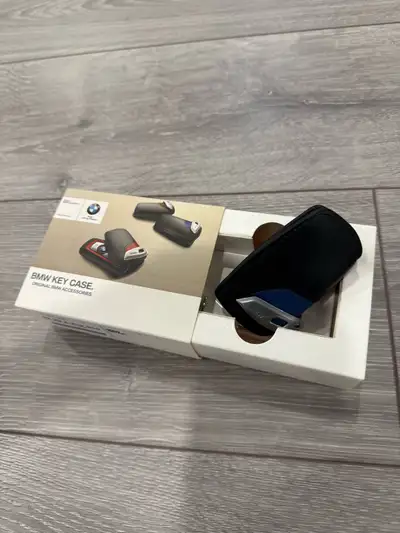 I am offering a brand new BMW Key Case, designed to provide a stylish and protective cover for your...