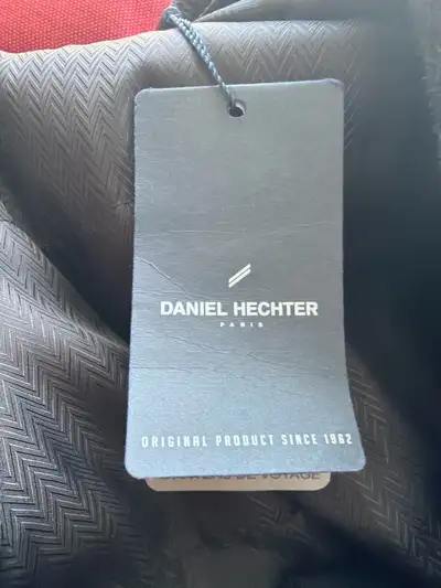 I'm offering a brand new Daniel Hechter Paris overcoat, size 4XT, in a stylish charcoal colour. This...