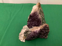 Two Amethyst Geode Clusters with a Pewter Miner Figurine