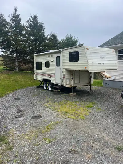 A/C, furnace, stove , oven, fridge. Fresh water holding tank with water pump. Table folds down to a...
