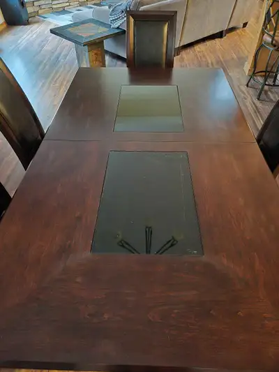 Dining room table and 6 matching chairs, View more