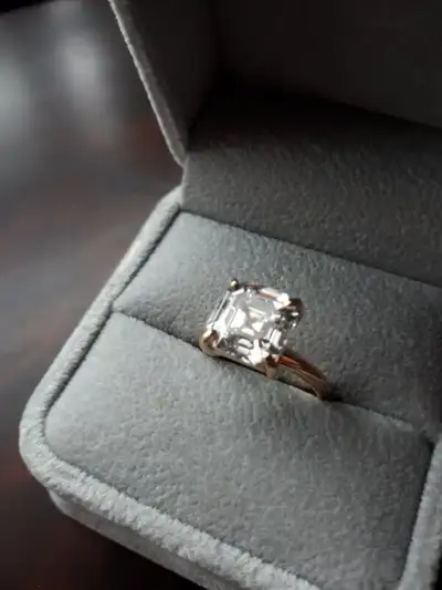 WOW, 4 carat Asscher Cut Moissanite solitaire set in solid yellow gold. Stone has the best brillianc...