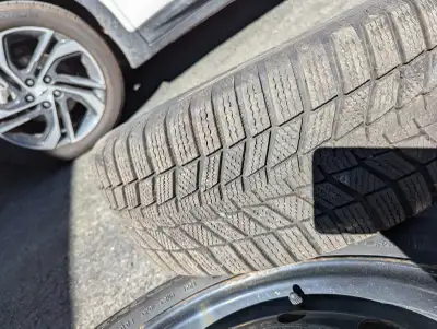 Tires and rims off a 2013 Nissan Leaf. Continental tires. Rims and tires in good to very good shape....