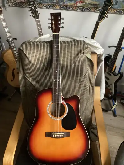 Caraya acoustic circa 2014 Beautiful sunburst finish Genuine binding on Mahogany neck & body Rosewoo...