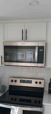 Whirlpool stainless steel over the range  microwave 1.7cu.ft,