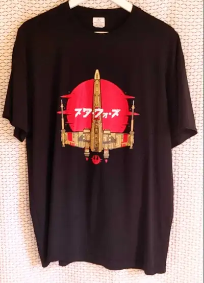 1 Tie Fighter black men's size XL t shirt and 1 Empire Strikes Back men's size XL black logo t shirt...