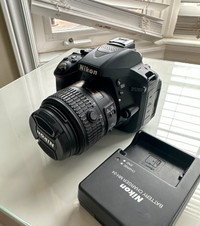 Nikon D5300 Camera Like New with charger, body and lens