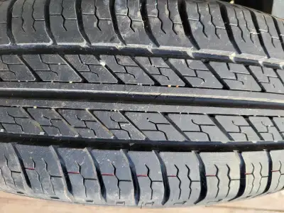 Selling one all-season tire with a size of 195/70R14. This tire is in used condition. It's ready to...