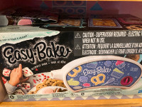 Easy Bake Oven- used once. Includes unopened cake mix.