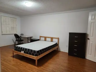 Master bedroom at upper level in a clean beautiful two-story detached house fronting onto Loafers La...