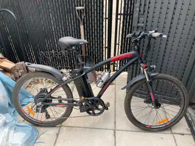 DJ Mountain Bike. Bought for $2,000 in spring 2023. Powered by a 500W 48V motor. Has 5 levels of ped...