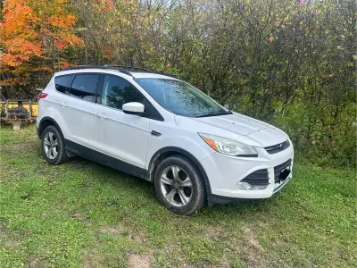 2013 Ford Escape SE AWD, as is. Good for parts or to fix. Needs windshield and exhaust work. Charged...