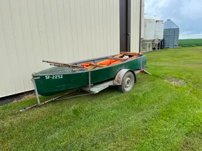 Homemade wooden boat. Measures 13' 6' long. Last used in 1997 flood. About 40 or 50 years old. 4 Com...
