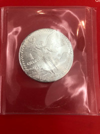 1983 MEXICO Libertad 1 Oz 999 Fine SILVER  Pura Plata-in Plastic