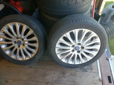 2 tires are flat from hitting curb. 2 rims has scratches