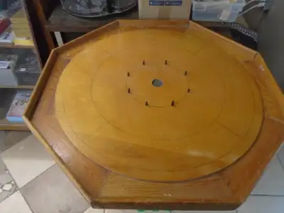 We have for sale a vintage or antique crokinole board in good condition considering its 80 years old...
