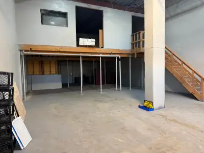 2700' Bay Available Now. San Francisco Building 9774 - 54 Ave. 20' Ceilings 12' x 14' Overhead Door...