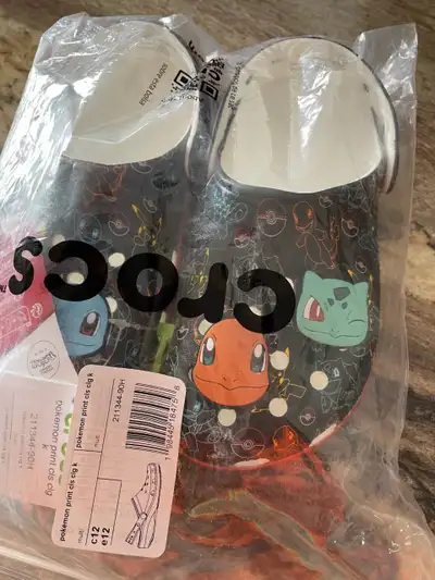 Kids brand new Pokémon Crocs still in the bag, size 12, smoke free home