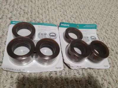 Great quality Two packages of new unopened Bronze curtain grommets Requires no tools just snap toget...