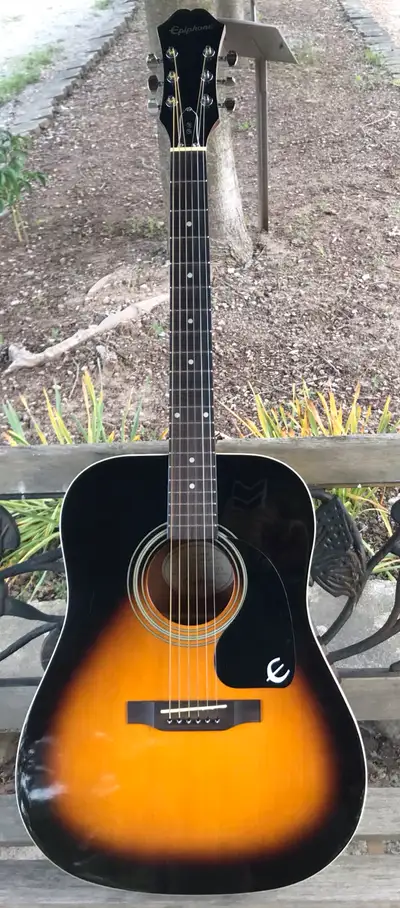 Lovely full size Acoustic Guitar - This Epiphone sports a vintage sunburst finish and has low action...