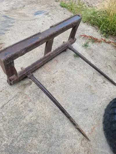 Bought this year's ago from a small ag dealer. Somebody's homemade skidsteer attachment. Doesn't act...