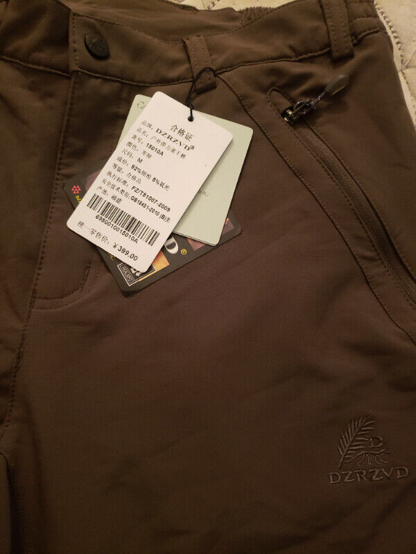 Mens pants tags on. 25$. Medium but run small in Men's in City of Halifax - Image 4