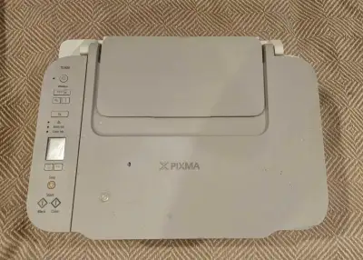 Canon Pixma model K10514. Works great, it was in the auto body shop so it has scratches.