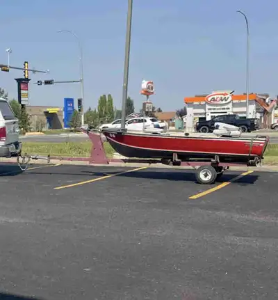 12' 1970 SEARS Aluminum fishing boat, completed with storage compartments, Rod holders, trolling mot...