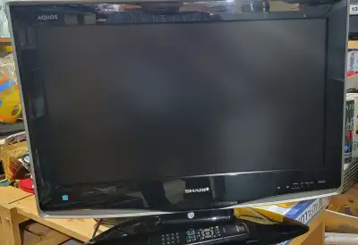 26" Sharp Aquos LCD TV . Great size for kitchen or bedroom viewing. Excellent condition. Has a remot...