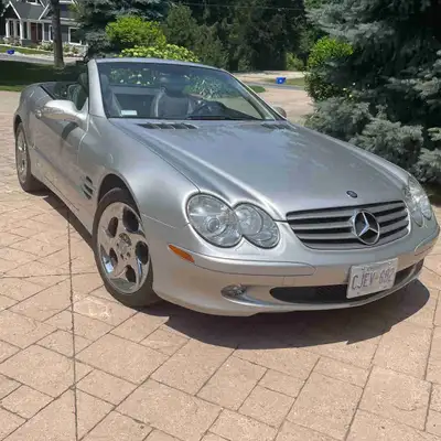 Check out this classic 2003 Mercedes-Benz SL 500! Convertible hardtop. Only 68,000 kms. Kenwood deck...